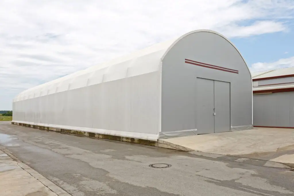 Engineered fabric building